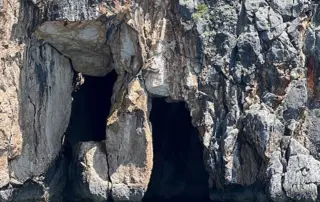 Pirates Cave boat tour from Himara Pirates Cave boat tour with crystal-clear waters and rocky coastline